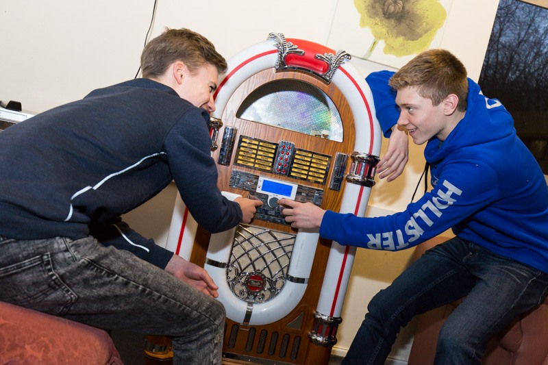 students using the jukebox machine