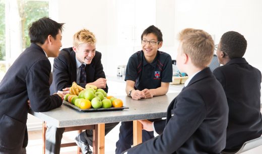 Students talking around a table