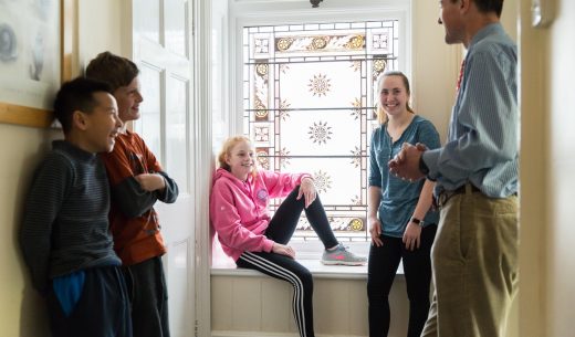 students around the window