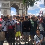 Students in front of the Arc de Triomphe in Paris
