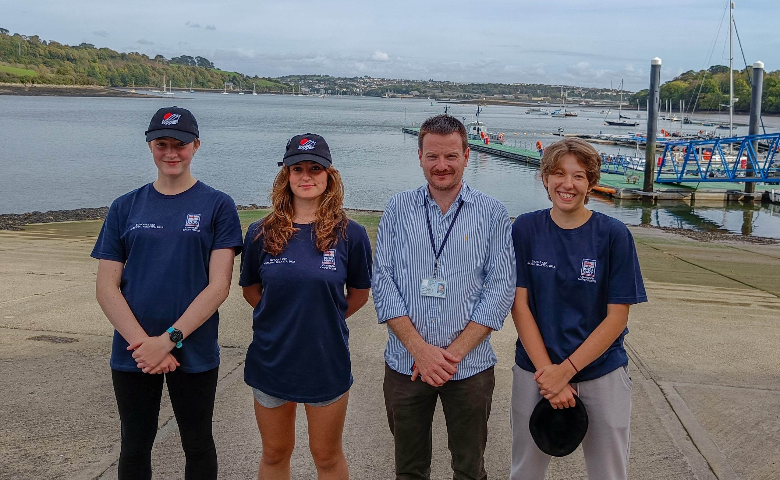 3 students and a teacher at the CCF national regatta