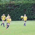 girls playing football