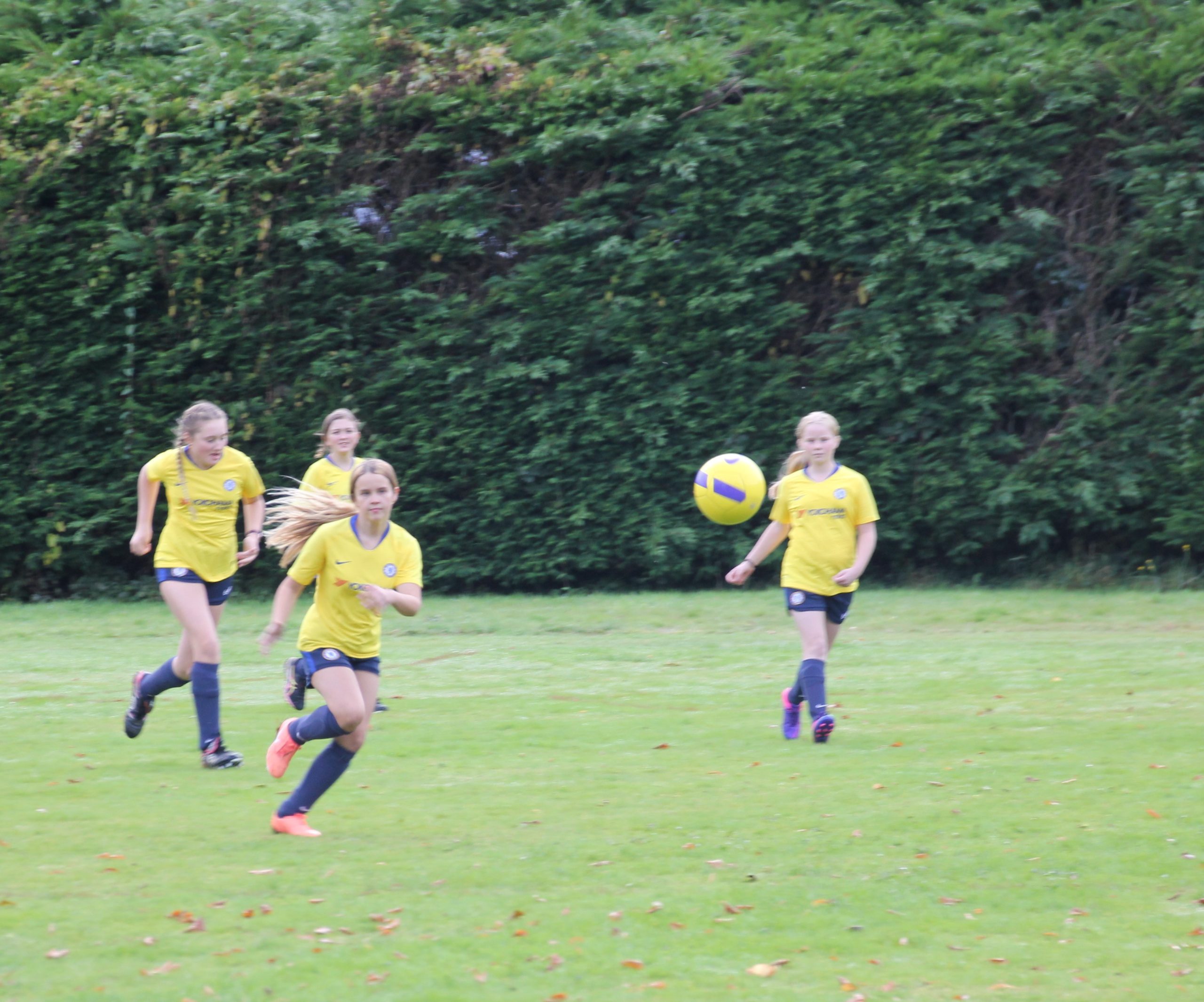 girls playing football