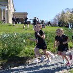 Group of girls running a race