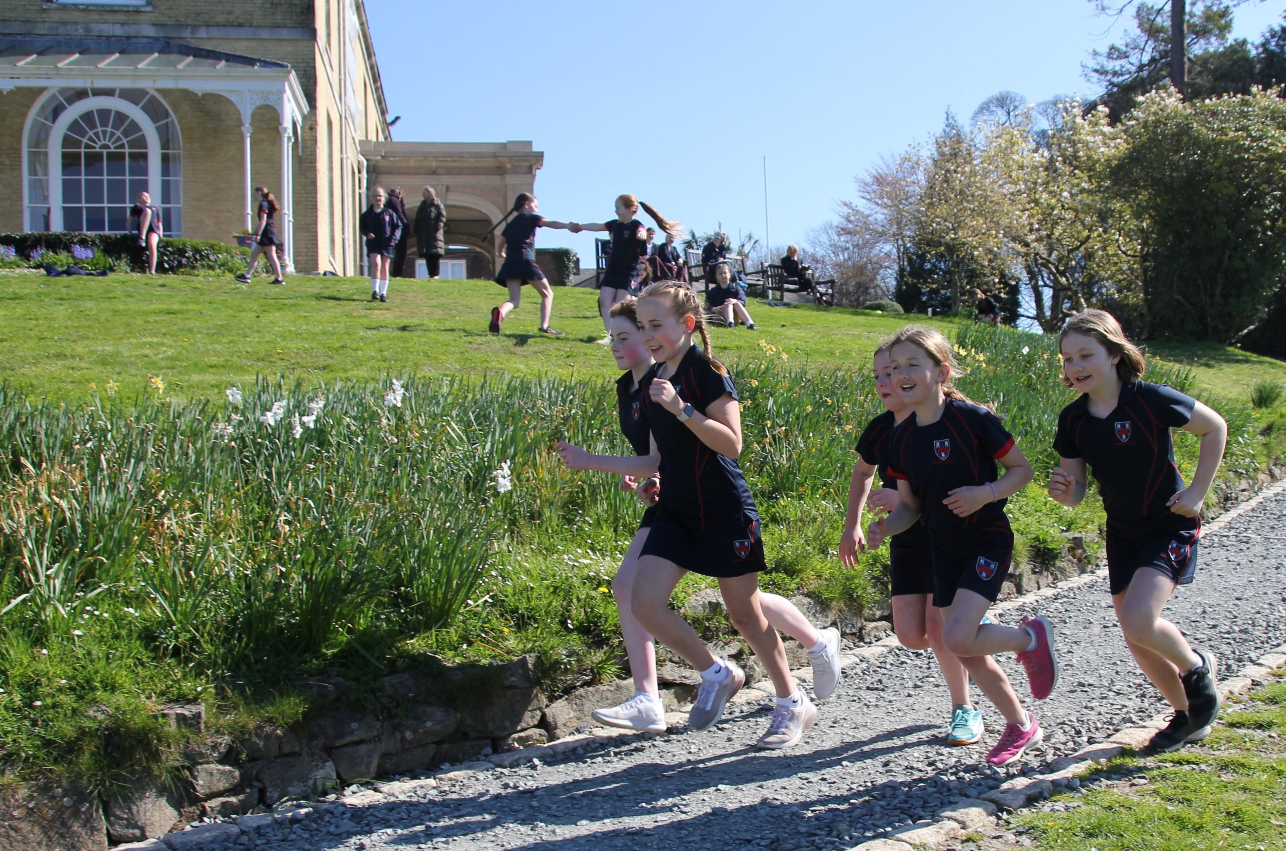 Group of girls running a race