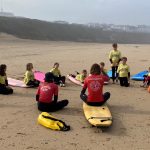 students learning how to surf