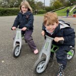 2 students on trikes