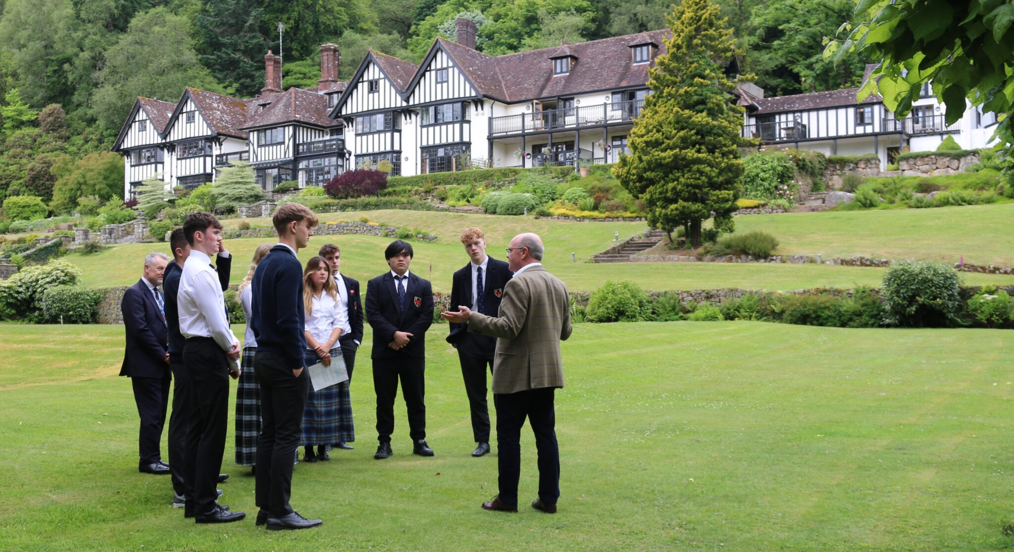 students standing on lawn