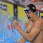 swimmer celebrating