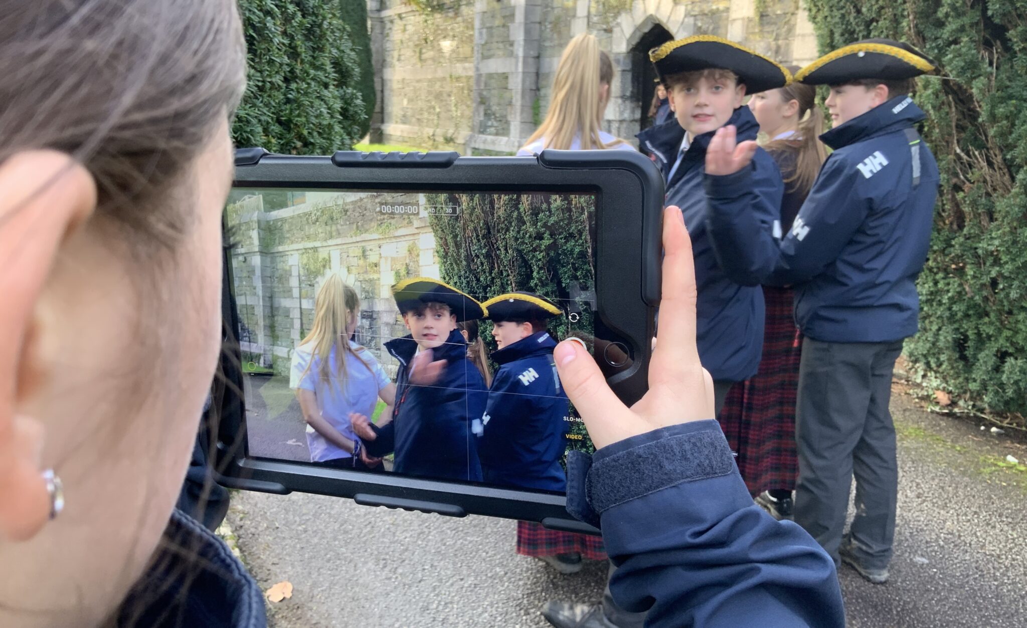 student recording on an ipad