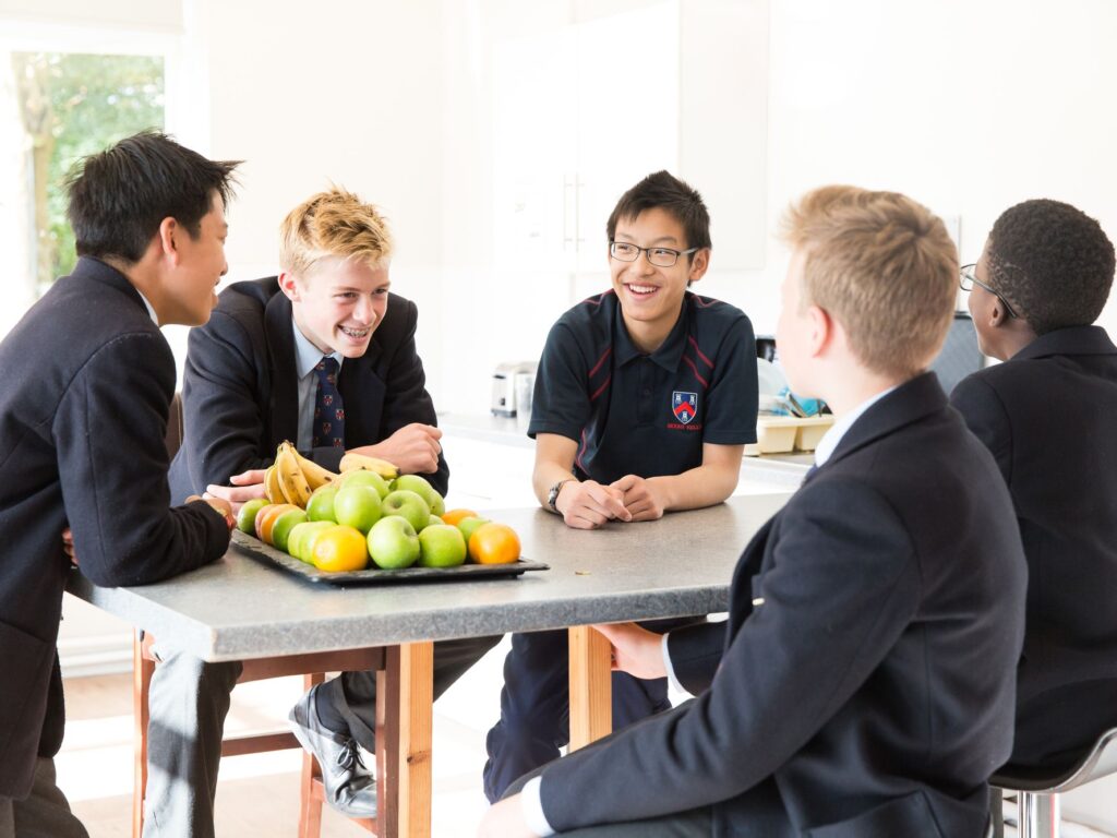 Students talking around a table