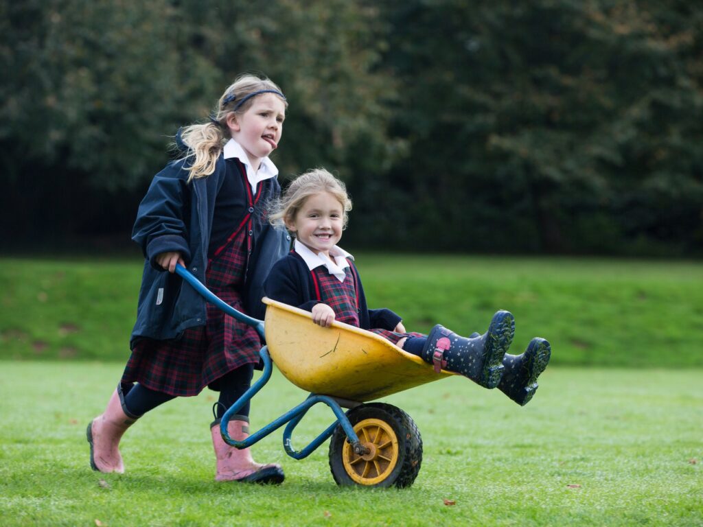 child in a wheelbarrow