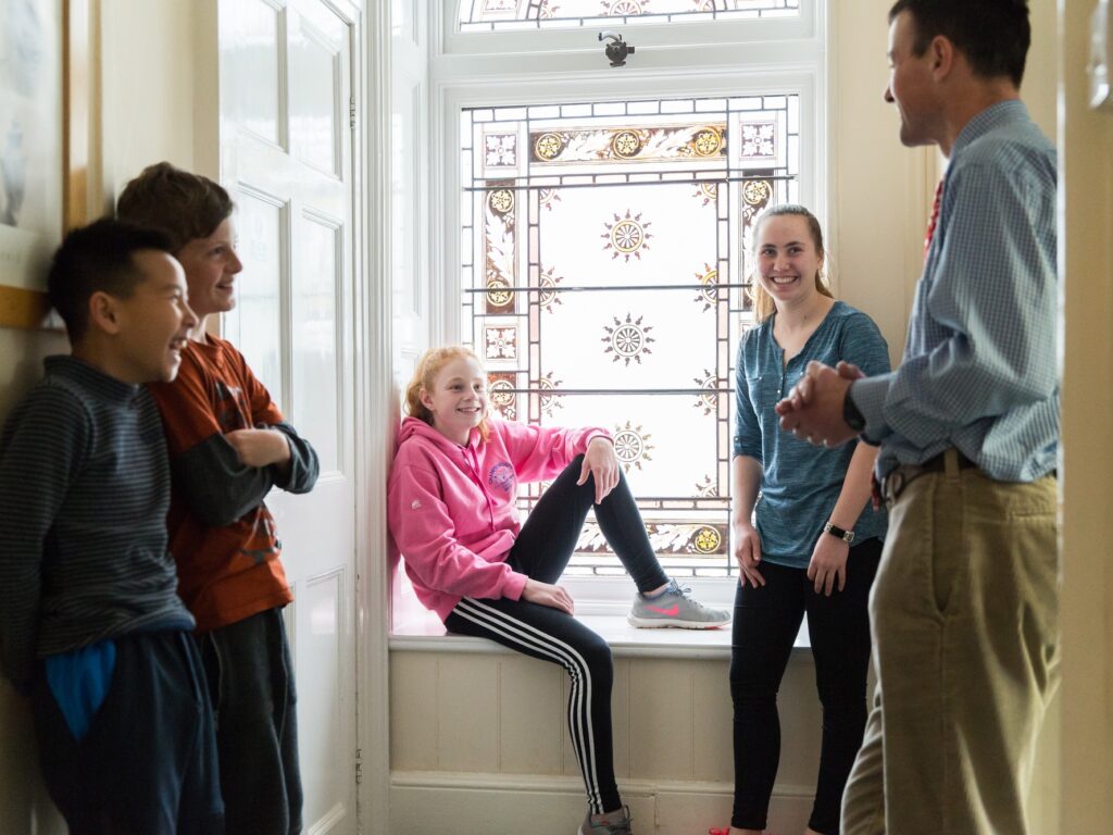 students around the window