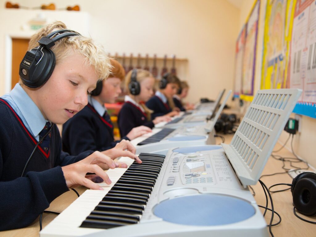 children playing the keyboard