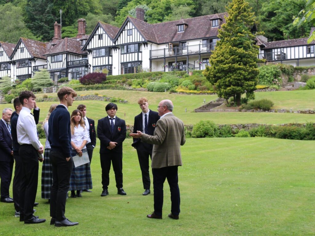 students standing on lawn