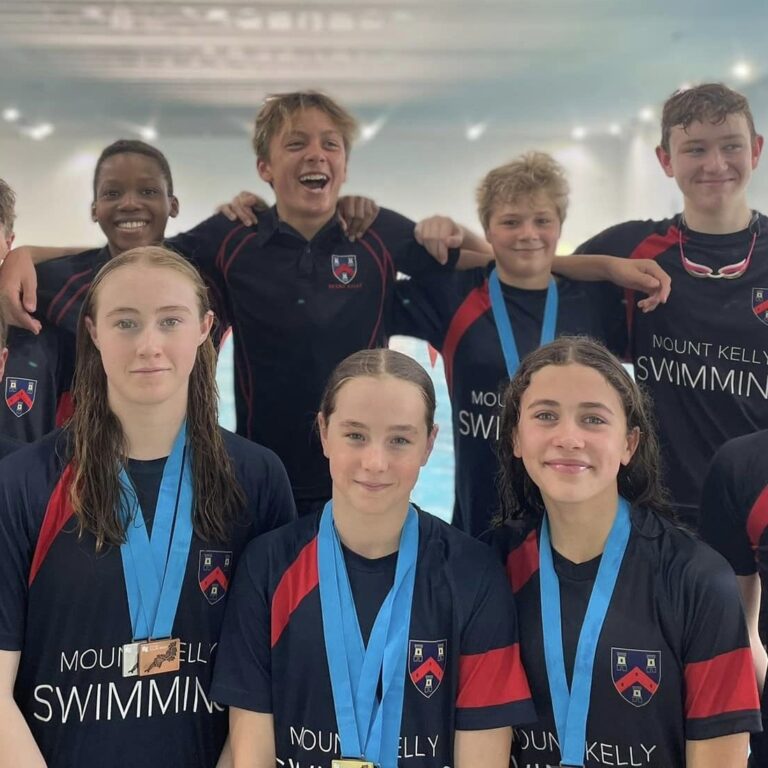 swim students with medals