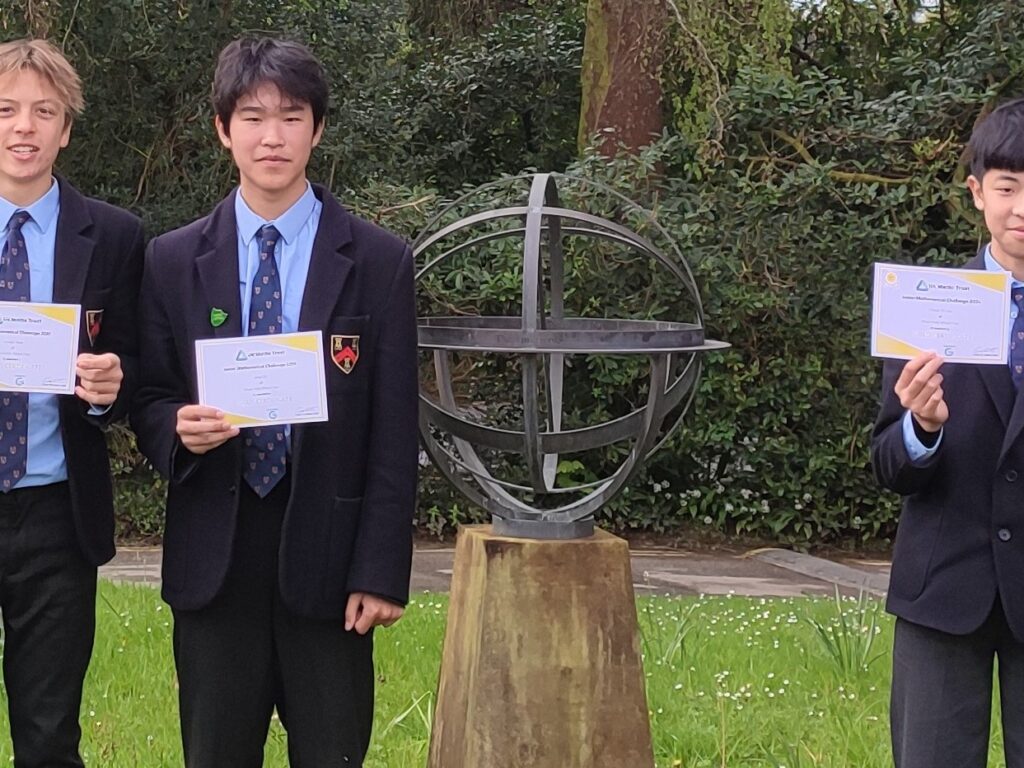 students holding certificates