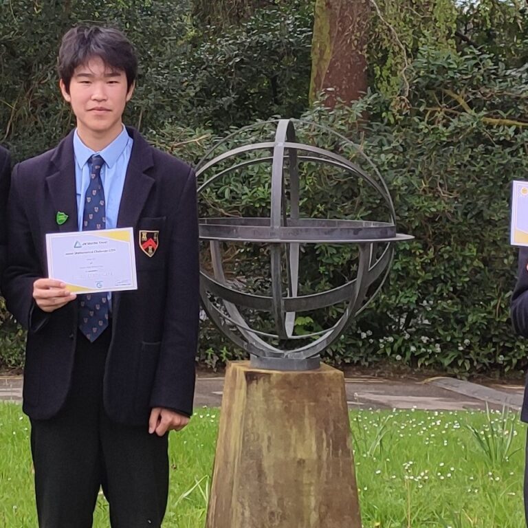 students holding certificates