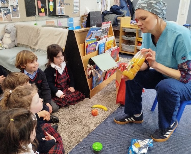 students with a dentist