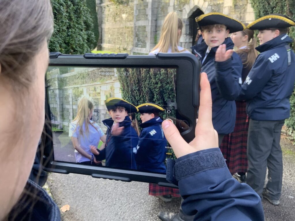 student recording on an ipad