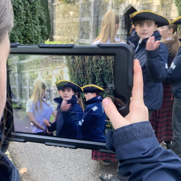 student recording on an ipad